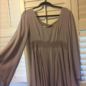 Criss cross back lavender long sleeved mini dress